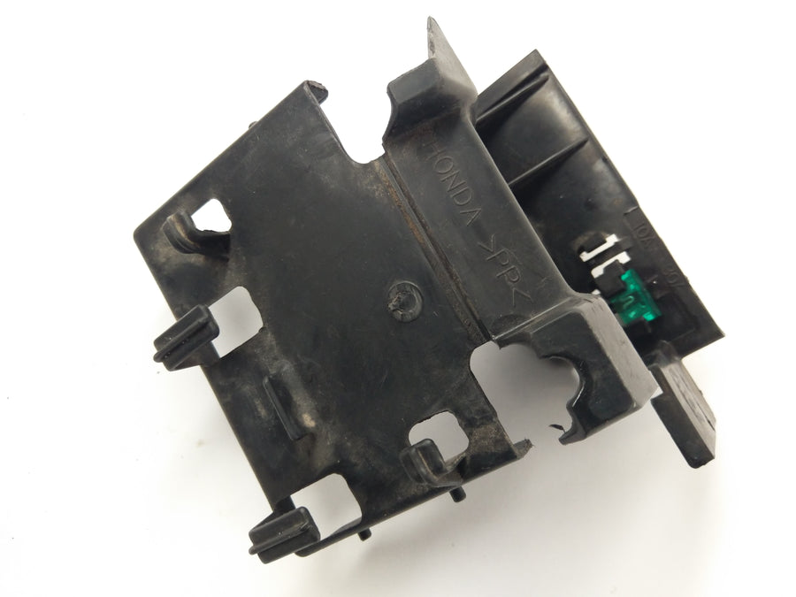 Honda CBR 125 JC34 [2006] - Compartiment à batterie
