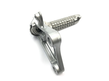 Suzuki GSX R 1100 GU74C [1987] - Footrest driver front left footrest bracket - 0