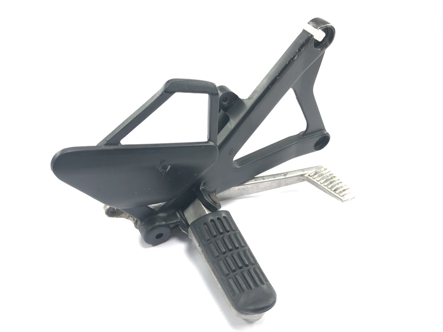 Honda NSR 125 JC20 [1991] - Footrest system, right driver footrest with brake pedal