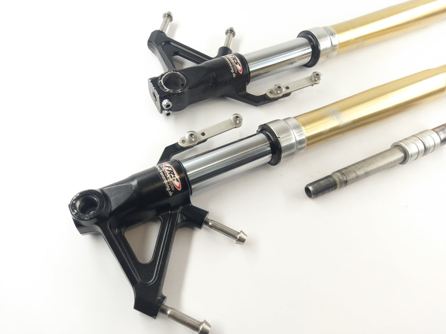 Triumph Speed ​​​​Triple 1050 515NJ [2006] - Fourche télescopique avec joints d'arbre d'essieu qui fuient